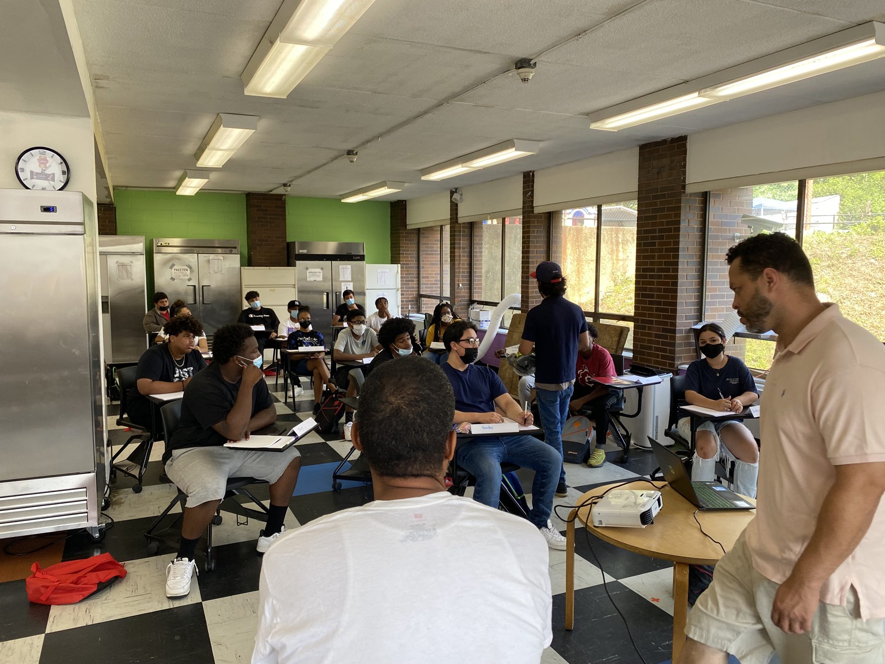 Wide view of a BTW training classroom mid-session